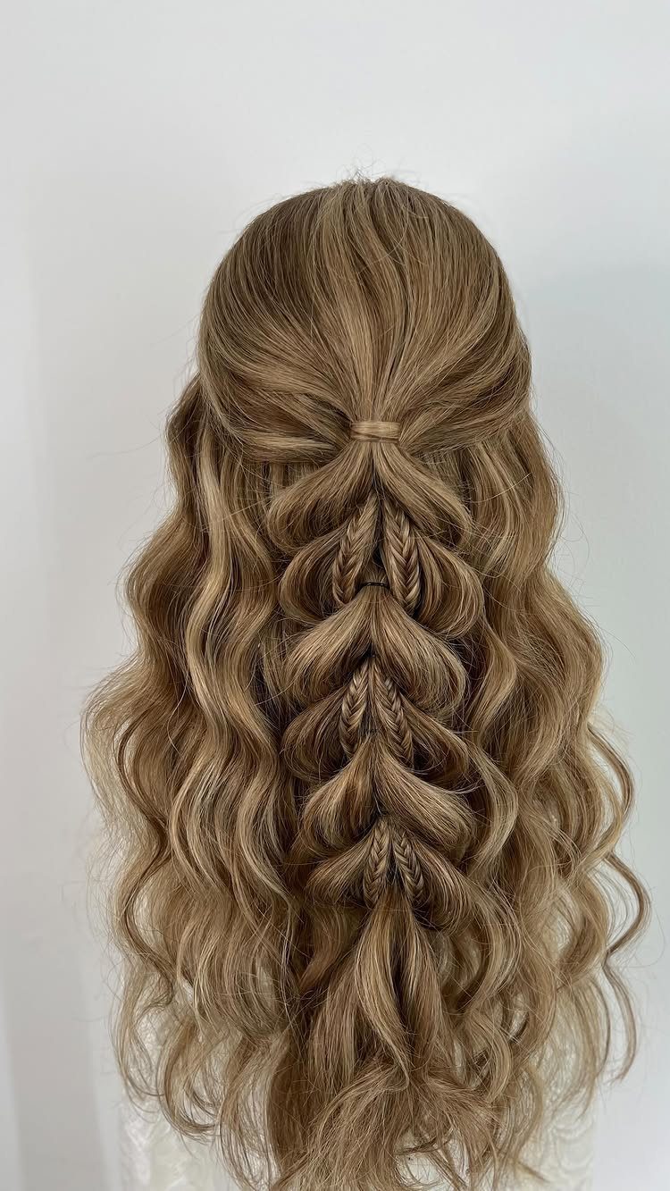 11 Half Up Half Down Wedding Hair Styles You'll Love 9 Long wavy light brown hair styled in a half-up half-down braided wedding look.
