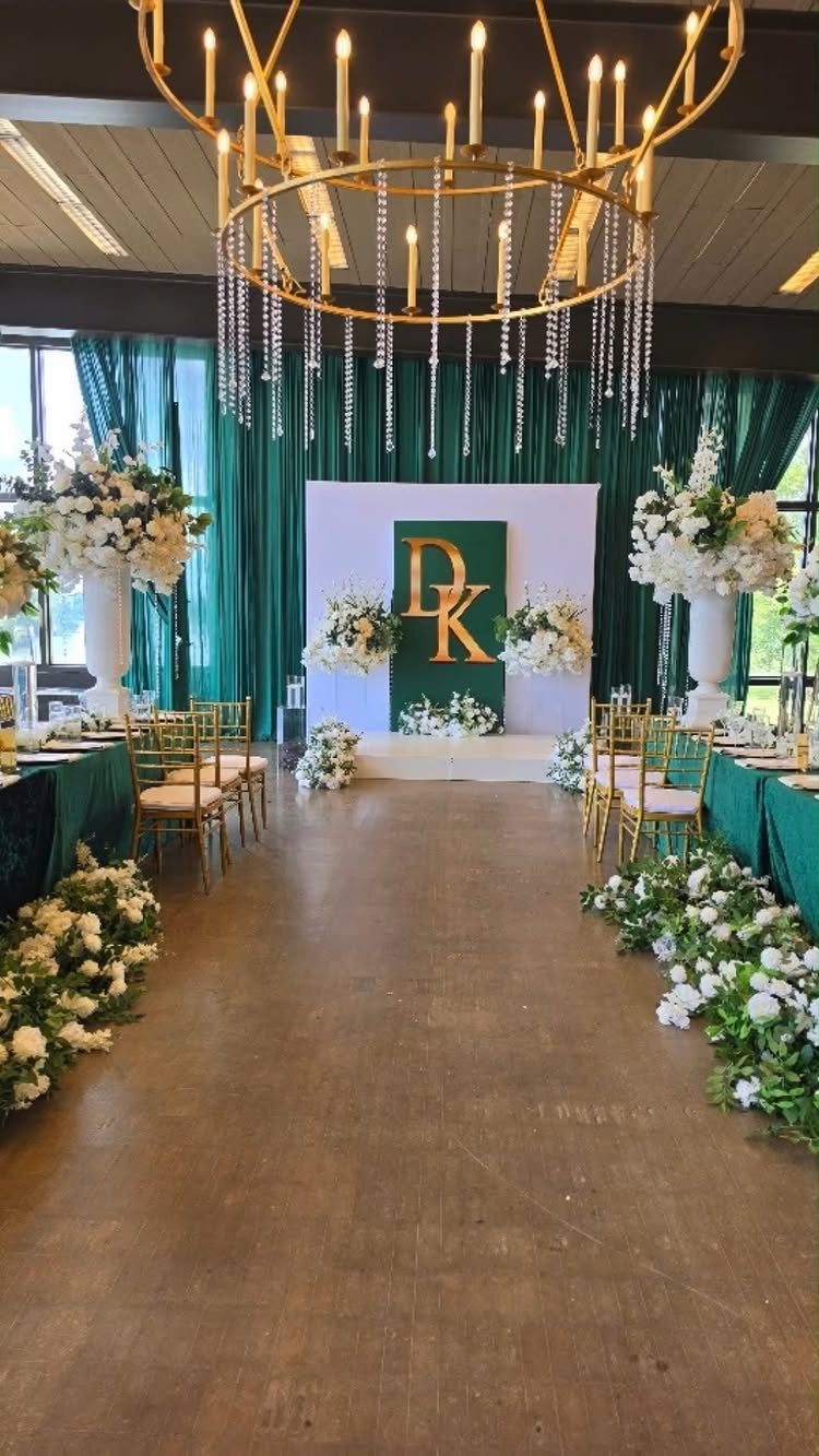 21 Color Combinations for Wedding Palettes in 2026 9 Wedding reception decor with emerald green linens, gold chairs, and white floral arrangements.