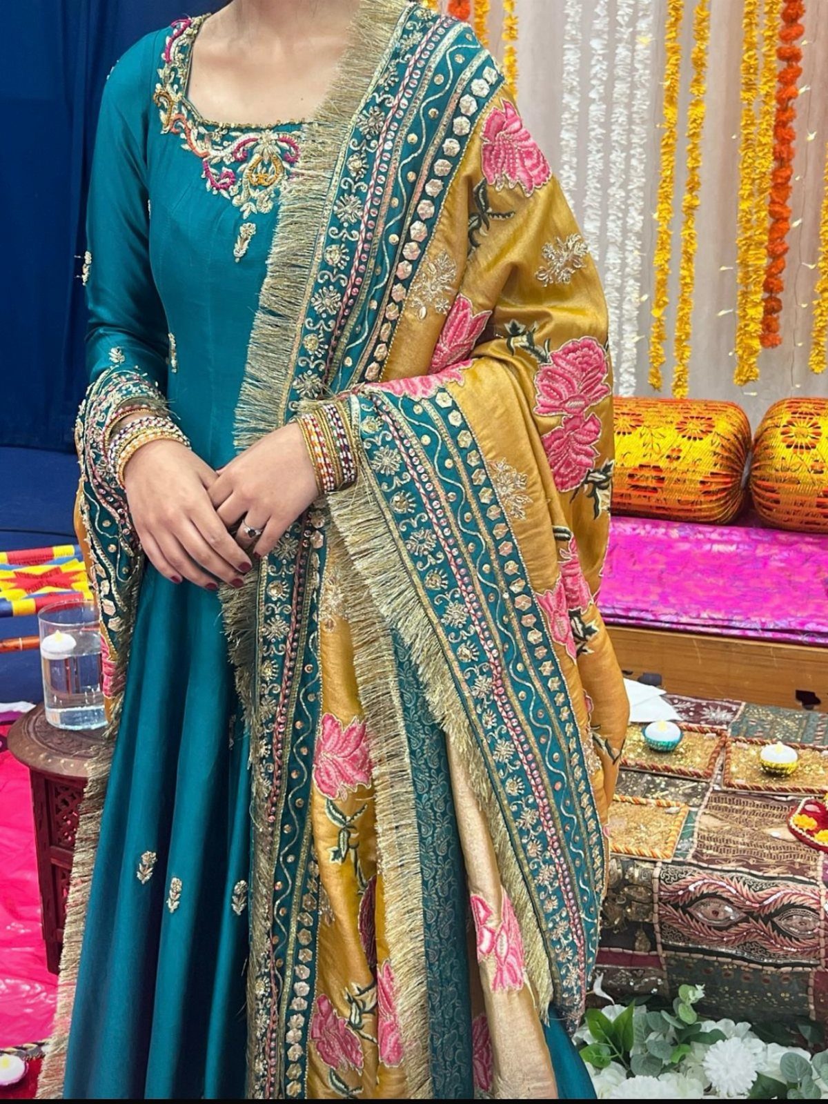 21 Color Combinations for Wedding Palettes in 2026 8 Teal blue traditional dress with mustard yellow floral dupatta and gold embroidery.