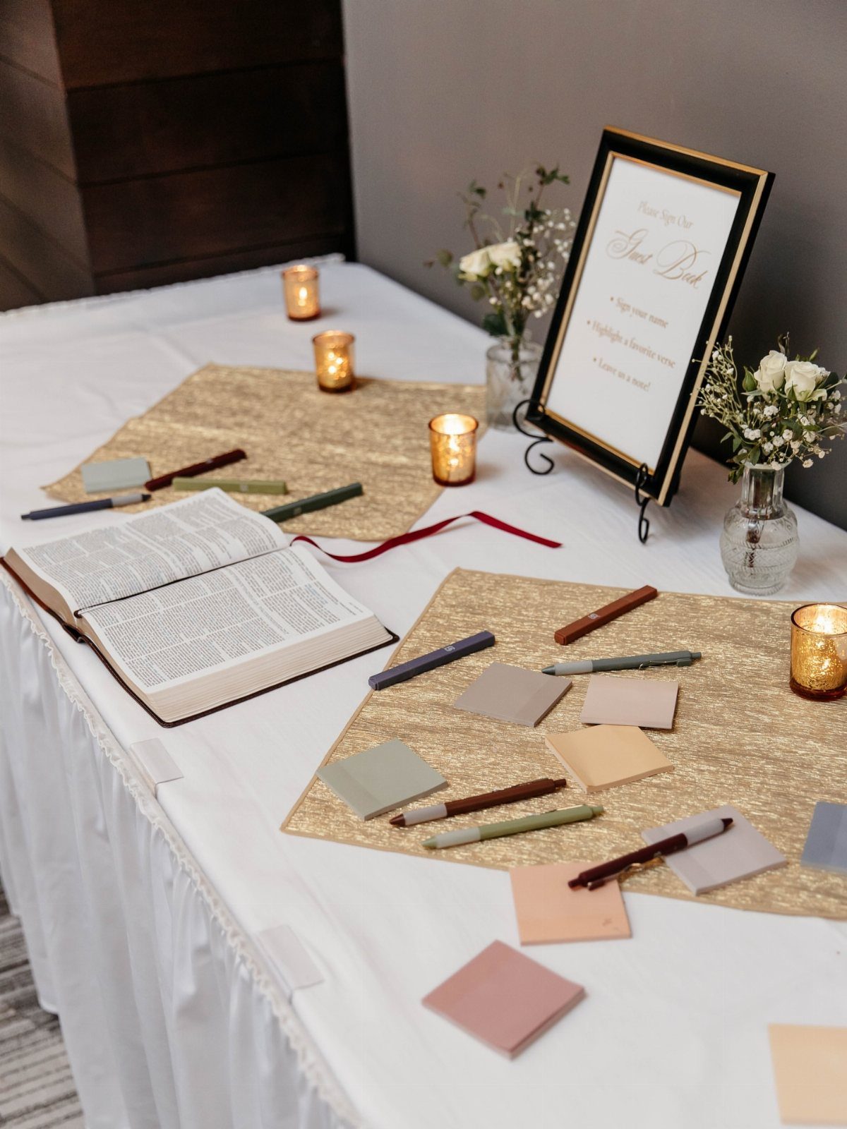 Flowers for Wedding Reception: 11 Elegant Ideas to Style Your Space 6 Guest book station with white flowers in vases, candles, and a framed sign.