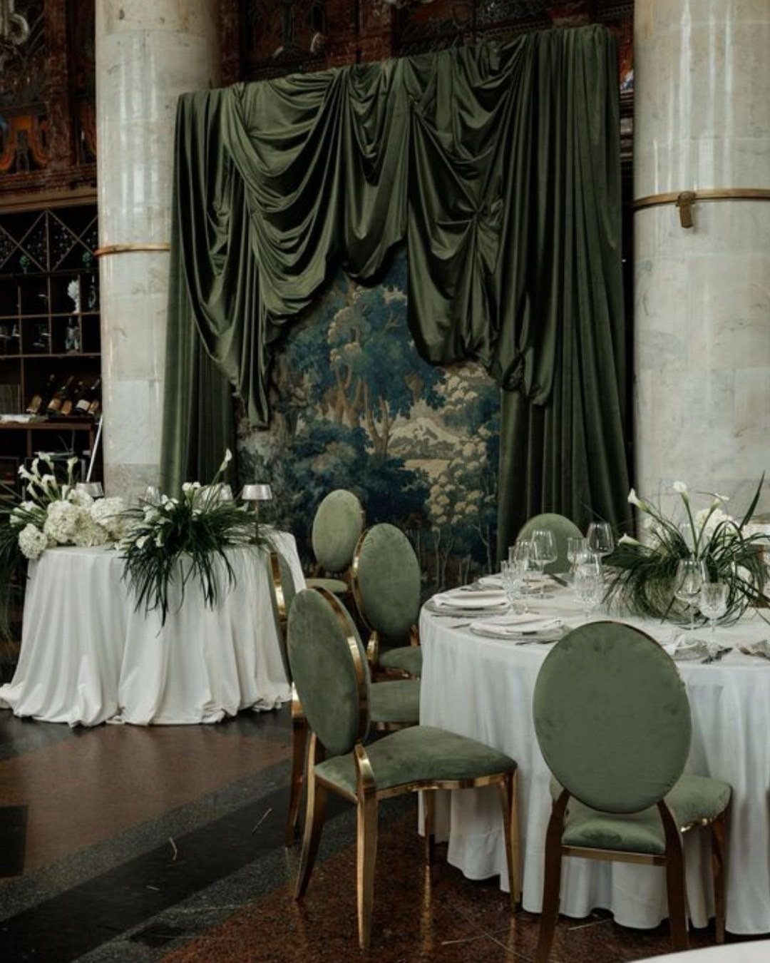 Forest Green for Wedding Colors: 10 Ideas to Try 11 Elegant wedding reception tables with white linens, green velvet chairs, and forest green drapery.