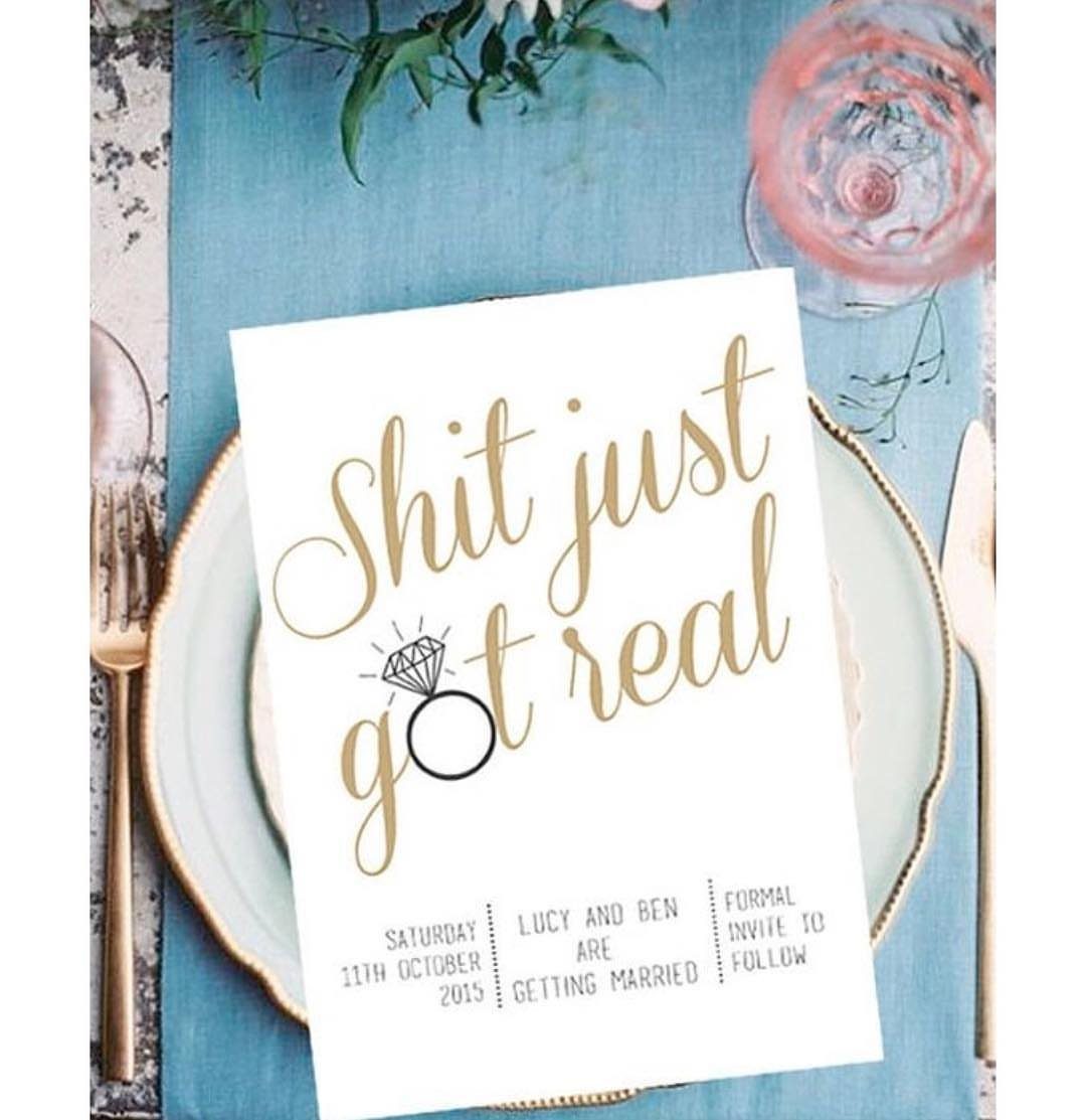 7 Funny Save the Date Ideas That Skip the Boring Part 4 Wedding invitation card with gold text saying Shit just got real on a plate