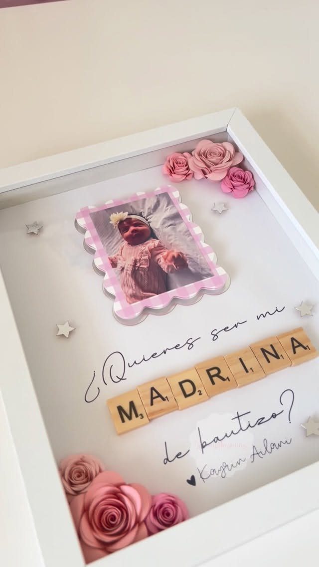 7 Godparent Proposal Box Ideas to Make the Ask Special 5 Shadow box with baby photo, pink roses, and wooden letters spelling Madrina.