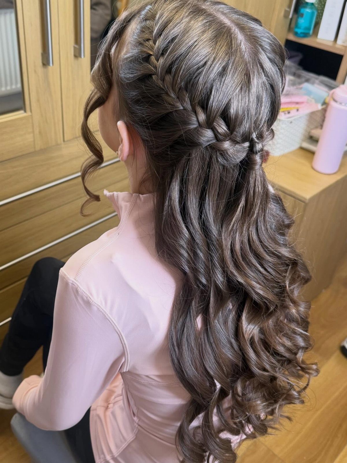 16 Long Hair Half Up Half Down Hairstyles for Real Life 3 Long wavy brown hair styled with thick side braids in a half-up, half-down fashion.