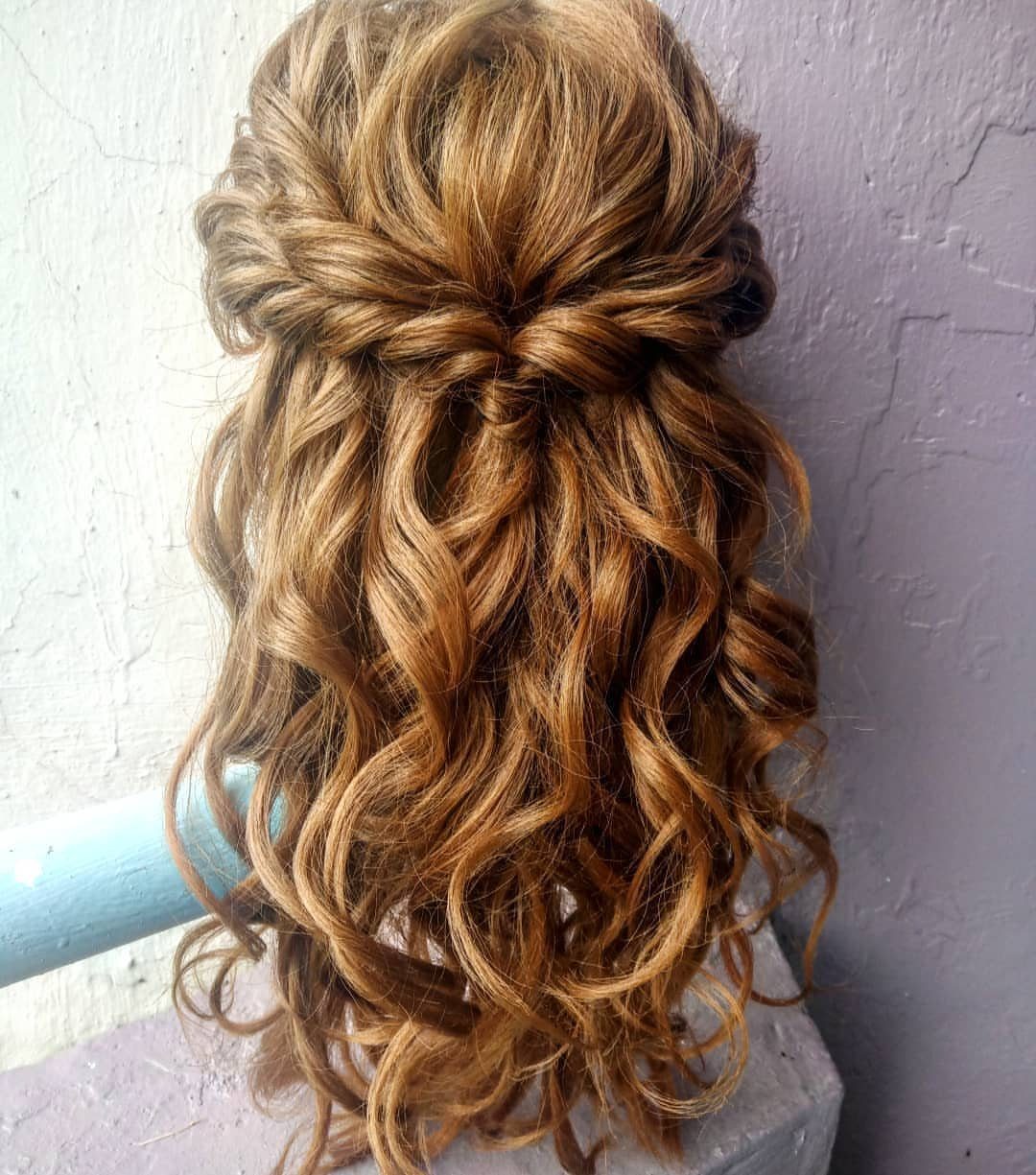 16 Long Hair Half Up Half Down Hairstyles for Real Life 9 Long honey-blonde hair styled in a half-up, half-down look with voluminous curls.