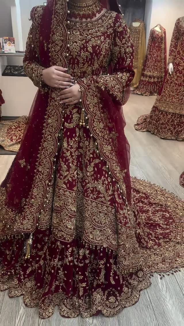 26 Nikah Dress Ideas for Your Perfect Wedding Ceremony 20 Burgundy velvet lengha with intricate gold embroidery and a matching dupatta.