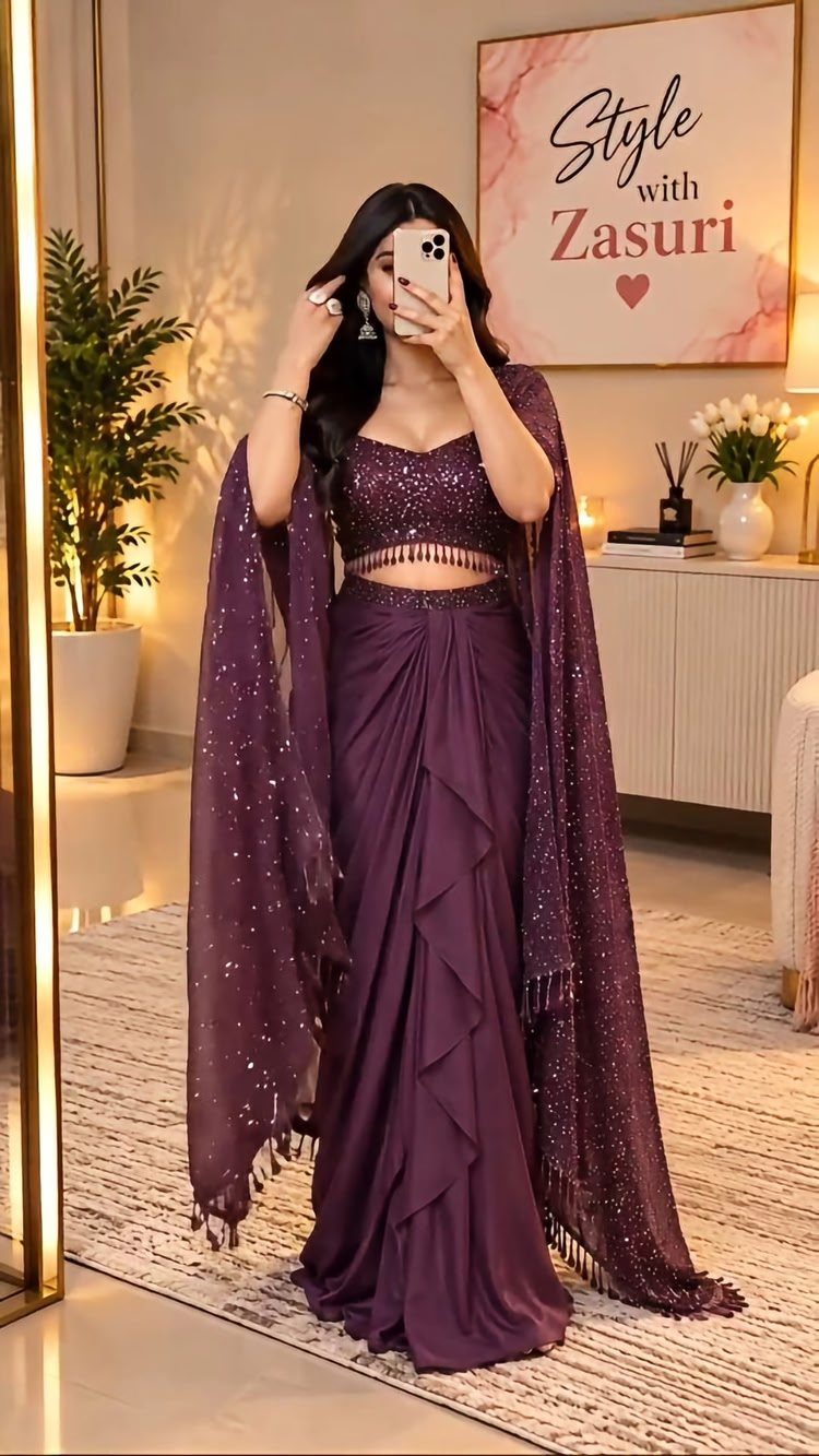 26 Nikah Dress Ideas for Your Perfect Wedding Ceremony 8 Woman wearing a purple sparkling crop top and ruffled skirt with a matching dupatta.