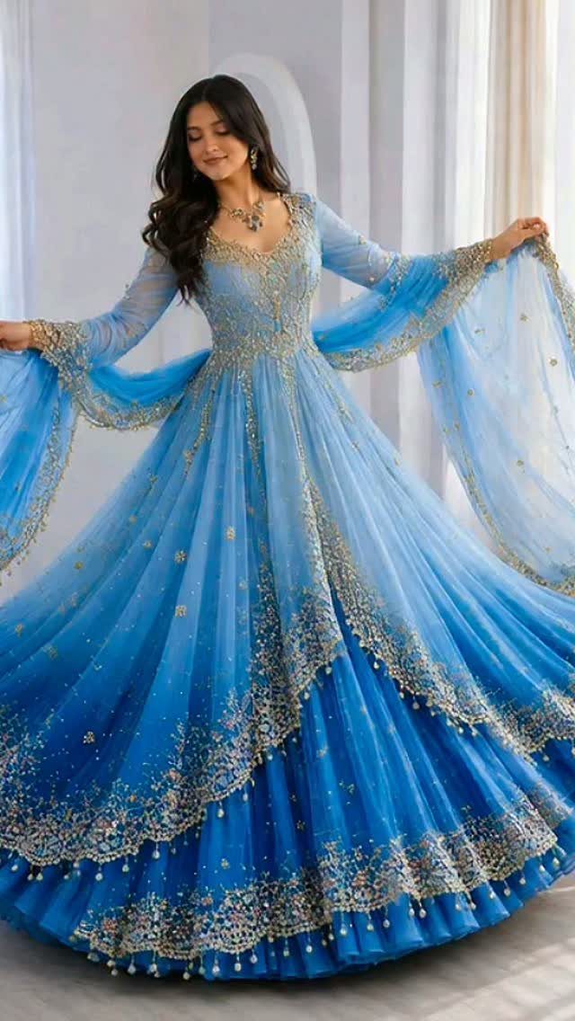 26 Nikah Dress Ideas for Your Perfect Wedding Ceremony 17 Woman in a light blue embroidered gown with a matching sheer dupatta.