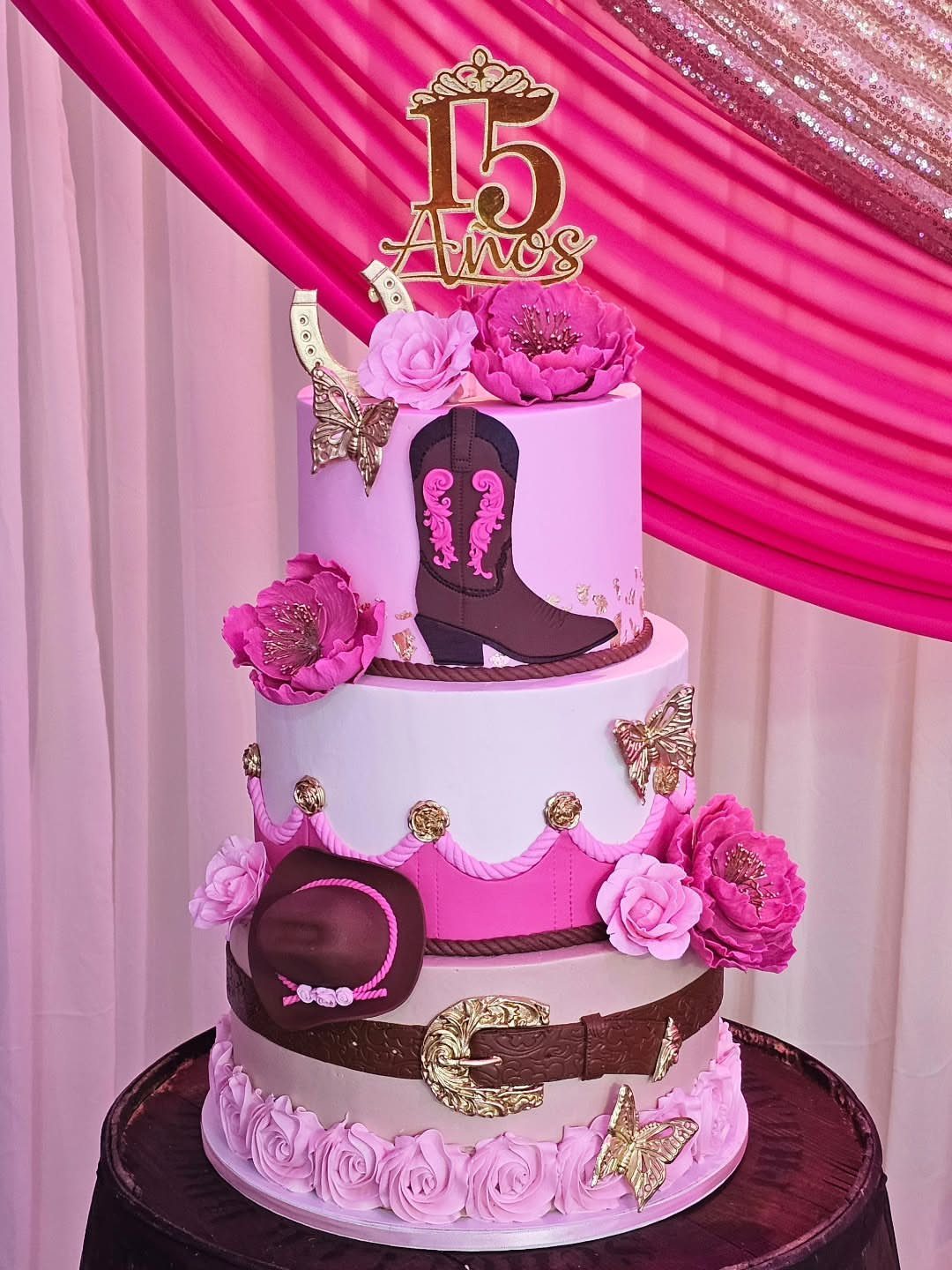 Quince Cake Ideas: 18 Designs From Florals to Butterflies 14 Multi-tiered pink and white cake with cowboy boots, hat, and gold 15 Años topper.