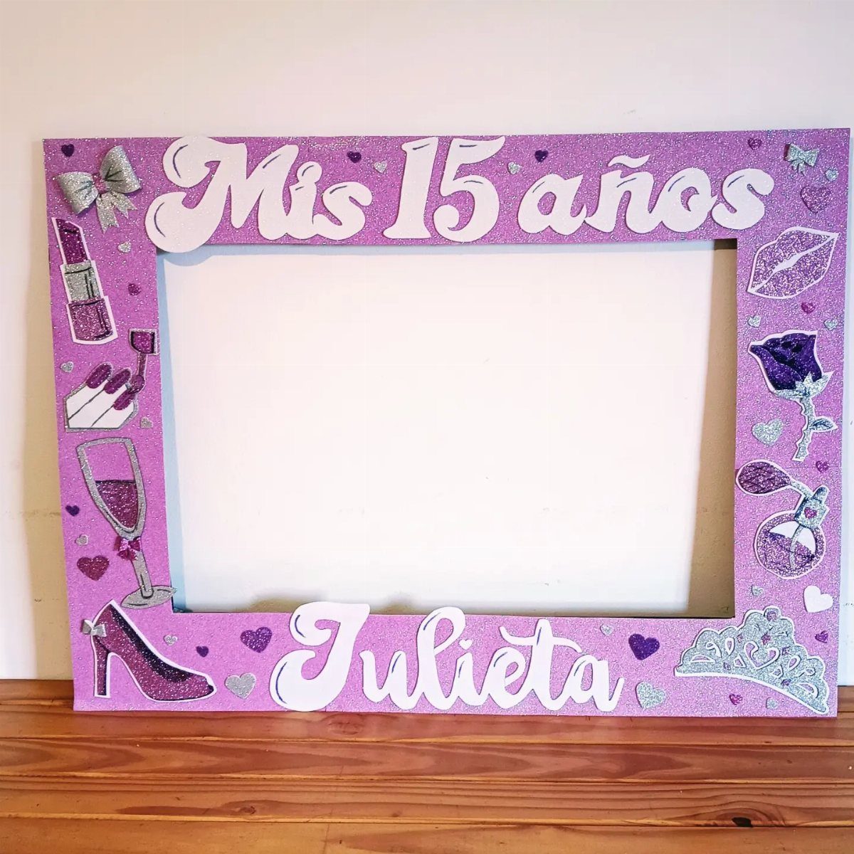 Purple glittery photo frame for a quinceanera with the text Mis 15 años Julieta.