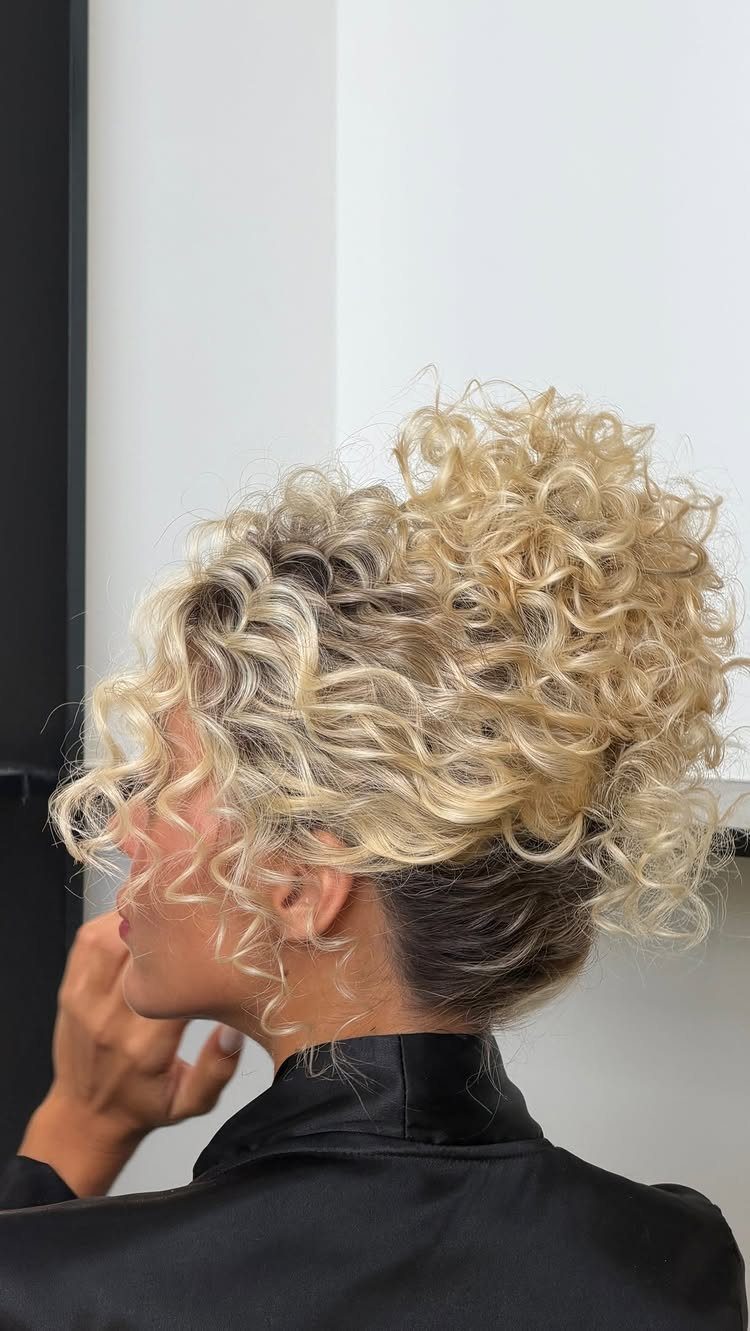 9 Short Curly Hairstyles for Wedding Day Perfection 5 Blonde woman with a voluminous curly bridal updo and side-swept curls.