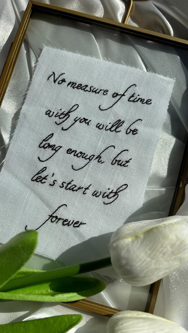Sister Wedding Gift Ideas: 34 Picks She'll Treasure 25 Embroidered wedding vows in a gold frame with white tulips and satin fabric.