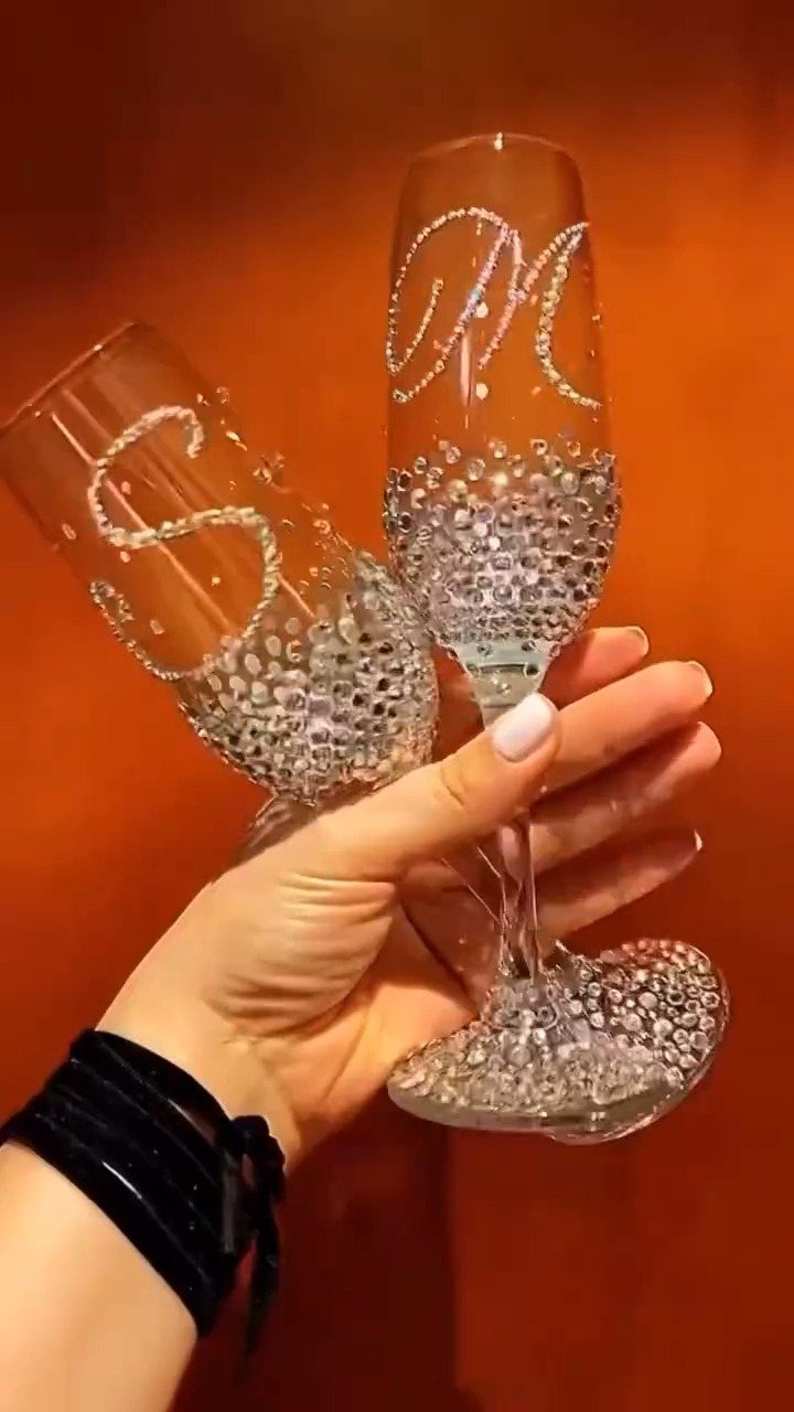 Sister Wedding Gift Ideas: 34 Picks She'll Treasure 19 Two champagne flutes decorated with silver rhinestones and personalized letters S and M.