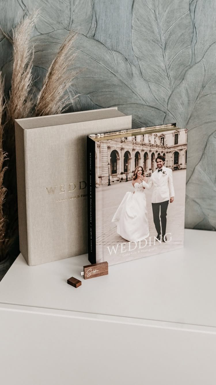Sister Wedding Gift Ideas: 34 Picks She'll Treasure 12 Wedding photo album featuring a bride and groom, paired with a linen storage box.