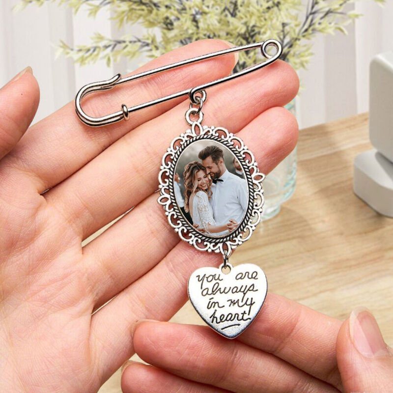 Sister Wedding Gift Ideas: 34 Picks She'll Treasure 30 Silver safety pin brooch with a couple's photo and heart-shaped engraved charm.