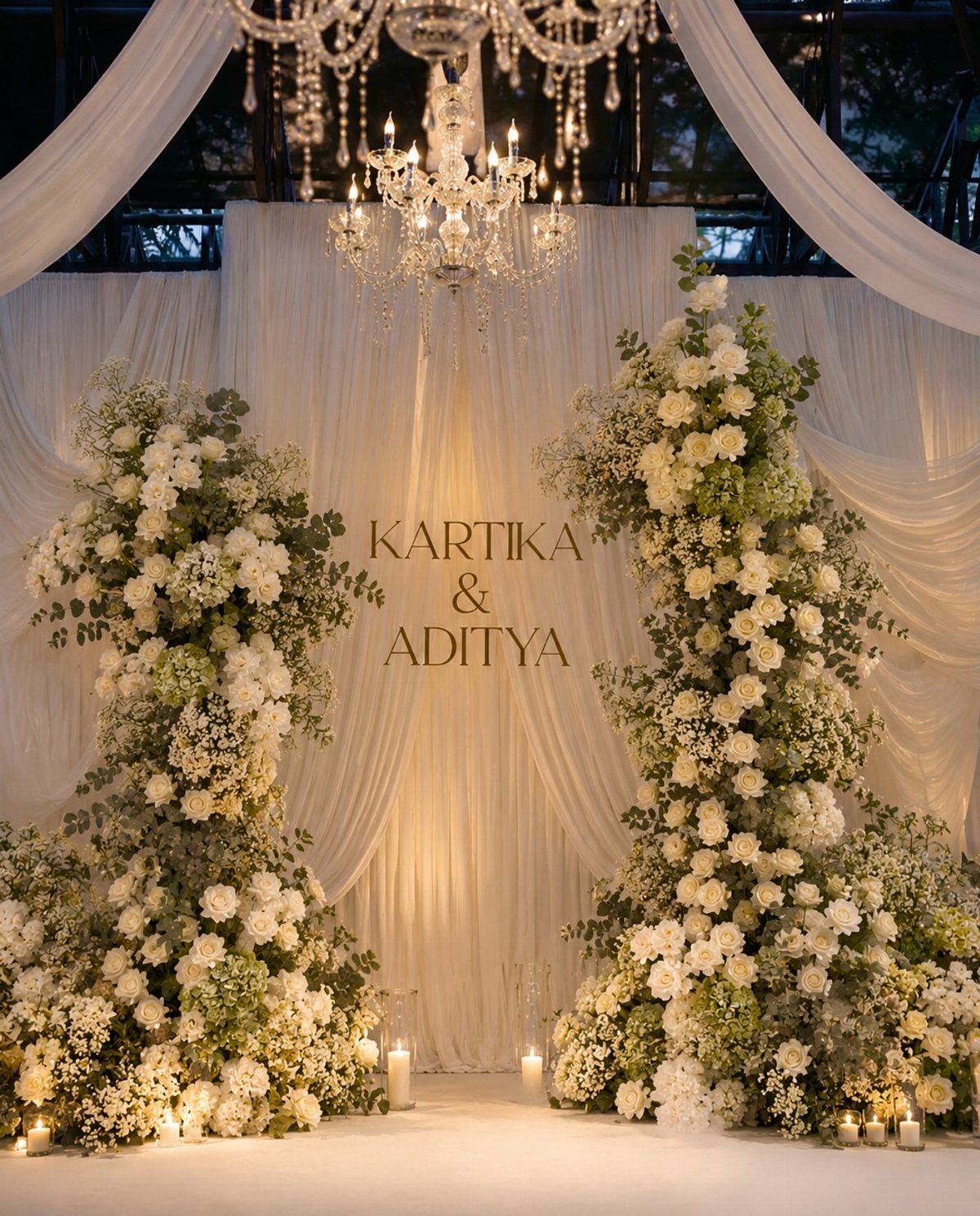 Wedding Detail Shots: 21 Ideas for Your Photographer 11 White floral arrangements and a crystal chandelier frame a draped wedding ceremony backdrop.