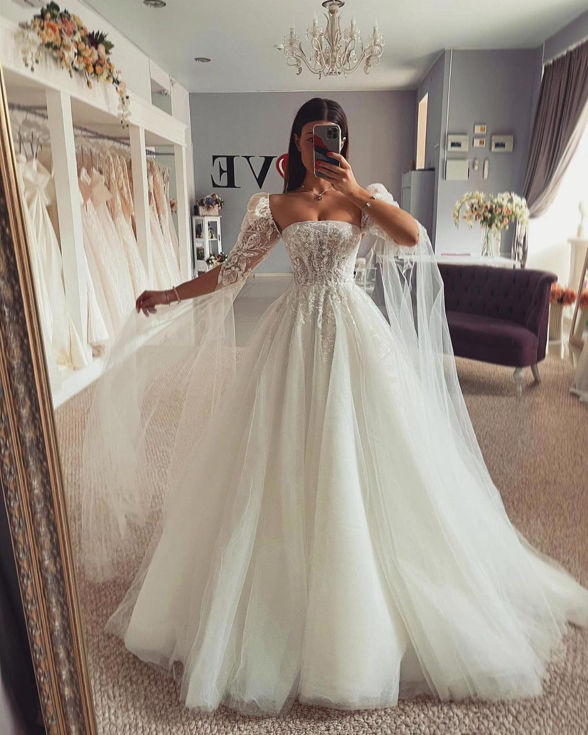 Tight Lace Wedding Dresses in 25 Beautiful Styles 16 Woman in a white wedding dress with a sweetheart neckline and lace bodice.