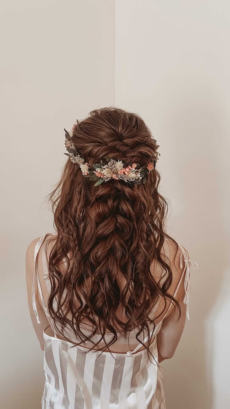 Wedding Theme Flowers: 21 Ideas for Ceremony to Cake 20 Long wavy brown hair adorned with a delicate crown of small pink and white flowers.
