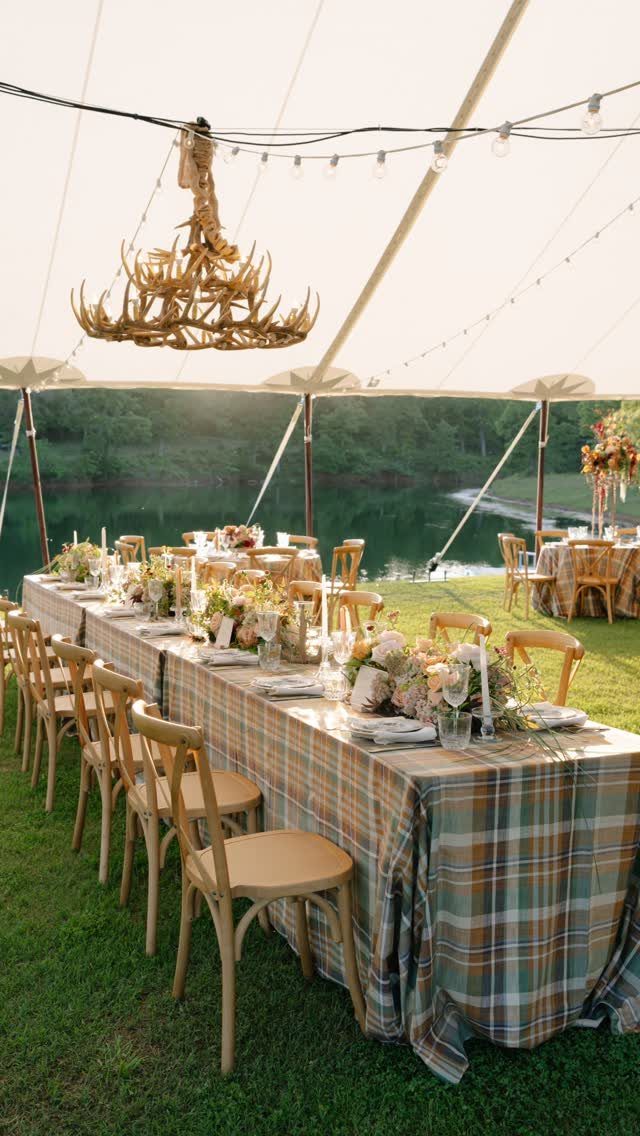What Are the Best Western Themed Wedding Ideas? 37 Here 27 Long plaid dining table with floral centerpieces under a white event tent.