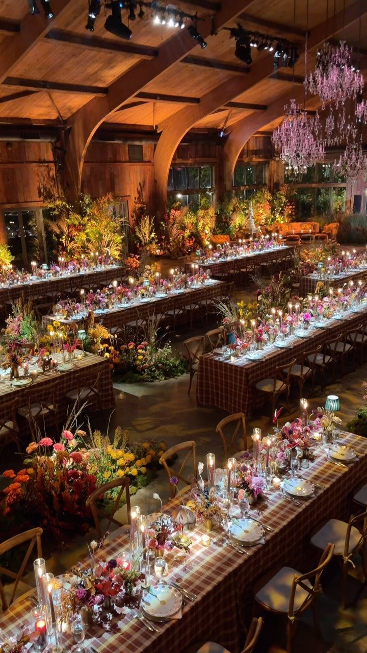 What Are the Best Western Themed Wedding Ideas? 37 Here 10 Rustic barn reception with long decorated tables, floral arrangements, and arched wooden beams.
