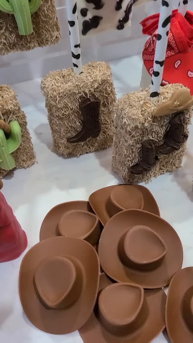 What Are the Best Western Themed Wedding Ideas? 37 Here 31 Western themed dessert treats with chocolate cowboy boots and hats on hay-like cake pops.