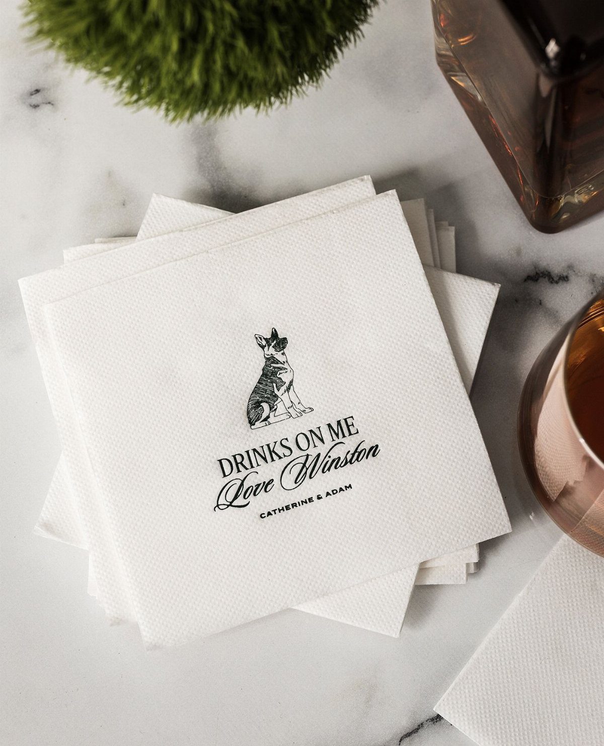 Whimsical Wildflower Wedding: 7 Decor Ideas That Feel Grown, Not Styled 3 White paper napkins featuring a black sketch of a dog and custom wedding text.
